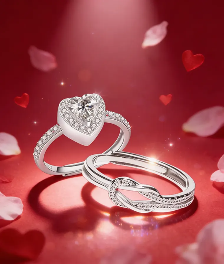 Two Hope Rings silver rings on a red background with rose petals